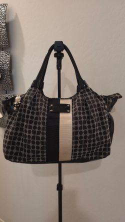 Kate Spade new york designer handbags Black And Cream Strip Purple Inside