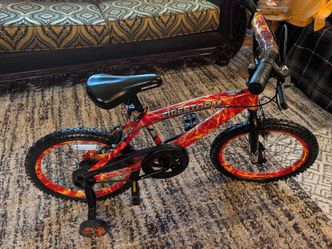 Kids 18- inch bike with training wheels. Excellent condition