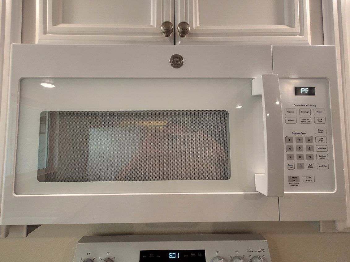 New White Microwave GE