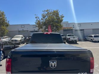 Low Profile Hard Trifold 2009-2026 Dodge Ram 6.4ft Bed