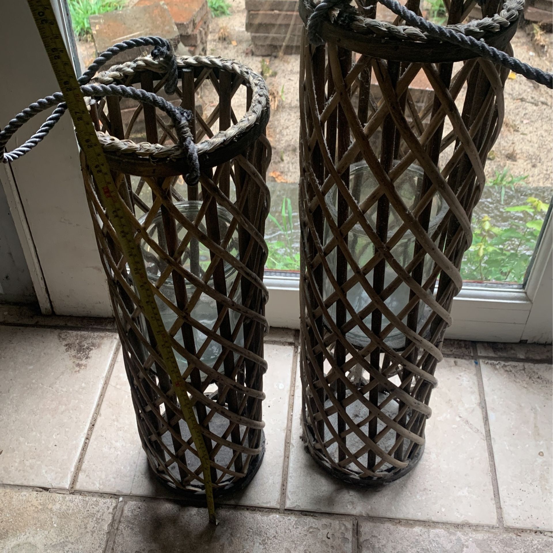 Two Glass And Wicker Hurricane Candle Holders