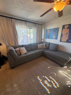 Gray Living Spaces Sectional Couch