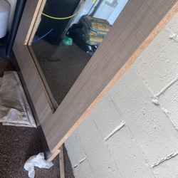 Tall mirror in frame