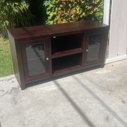 “Wooden TV Stand/Entertainment Center with Glass Doors”