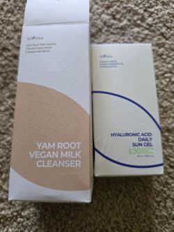 Skincare products. Sun gel and vegan milk cleanser
