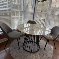 Round Marble Finish Dining Table with Chairs