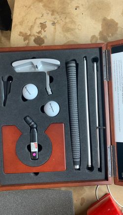 Brookstone laser golf trainer putting set
