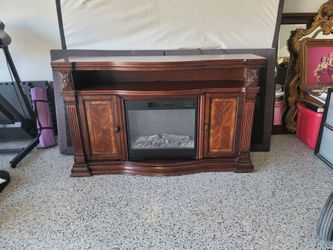 Fireplace heater/entertainment center