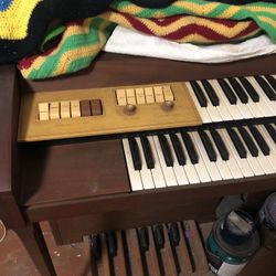 Silver tone/solid state  Organ and Also a Wurlitzer Piano .