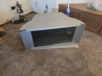 Swivel Grey tv stand with glass doors