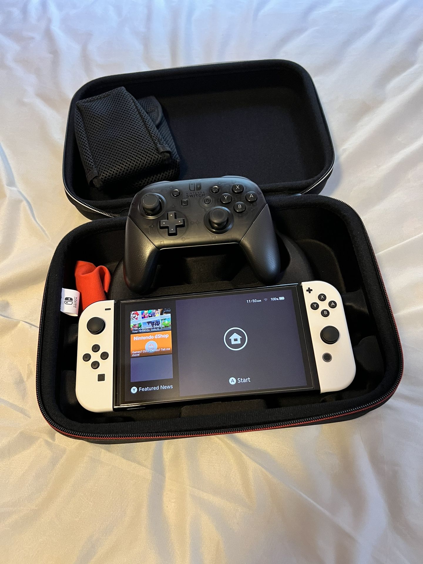 Nintendo Switch OLED W/pro Controller And Carrying Case