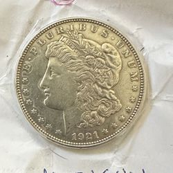 1921   O morgan silver dollar ms63
