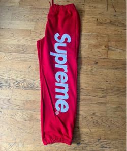 Red supreme cuffed sweats