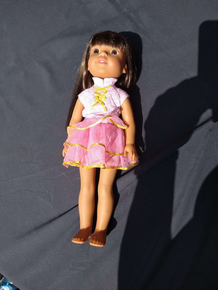 American girl doll brown hair hazel eyes slight freckling on the face used but like new