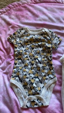 Calvin Klein baby girl onesies