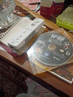Wii game controller in good condition and one game that goes with it