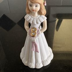 Vintage 1982 Enesco age 8 brunette porcelain figurine from the growing up girls collection
