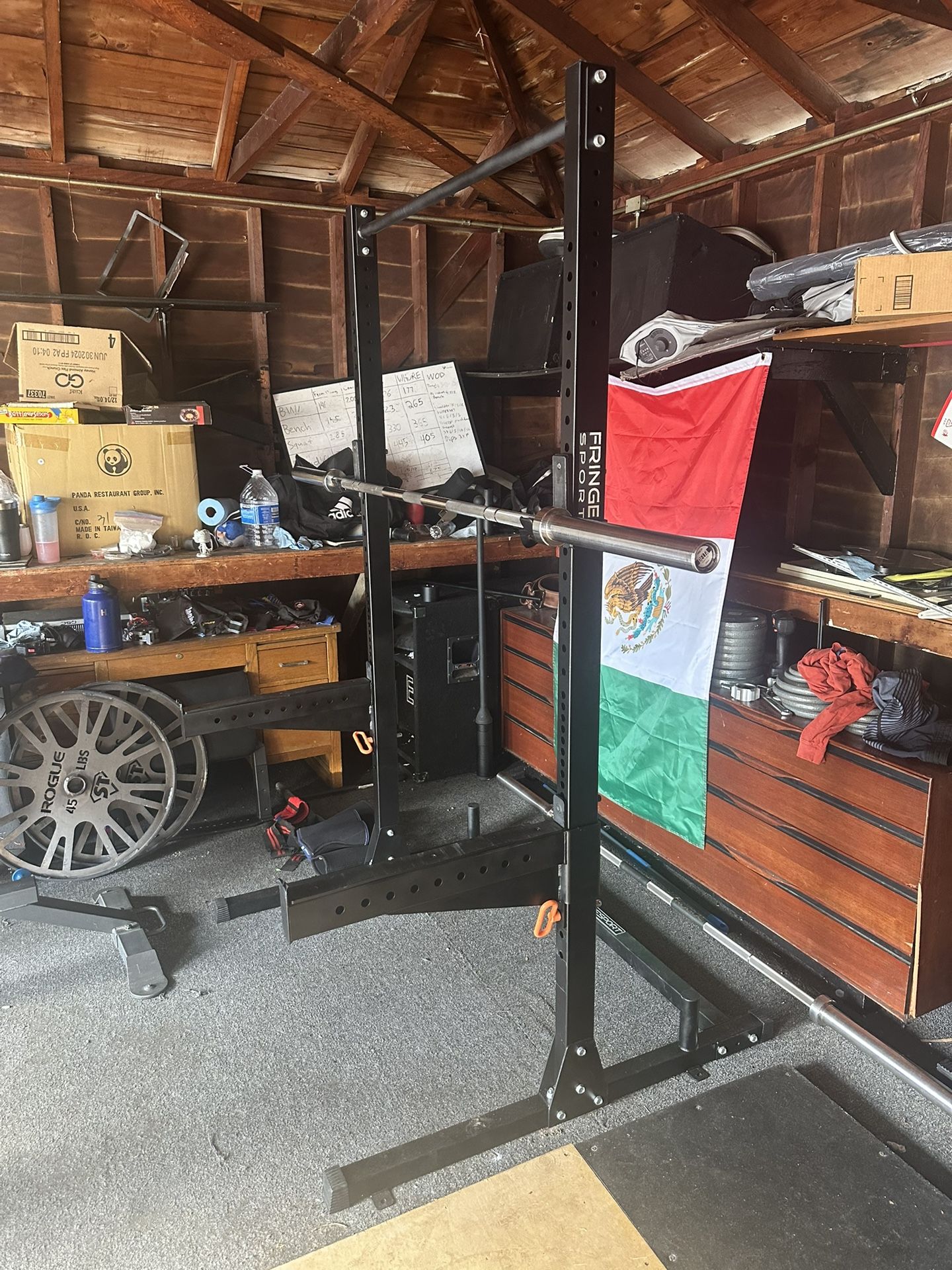 Squat Rack With Barbell And Weights 