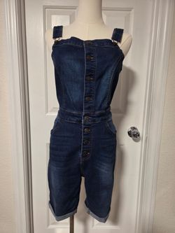 Wax Jean navy blue denim jumpsuit with button-up front and adjustable straps