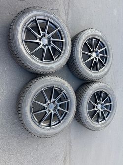 LIQUIDMETAL 18” wheels 5x108 with 225 60 18 Bridgestone Blizzak DM-V2 winter tires