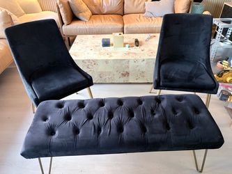 Matching black velvet and gold leg dining chairs and bench