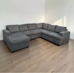 GREY SECTIONAL COUCH ***FREE DELIVERY ***