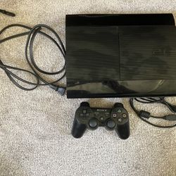 PS3 w/ controller and games