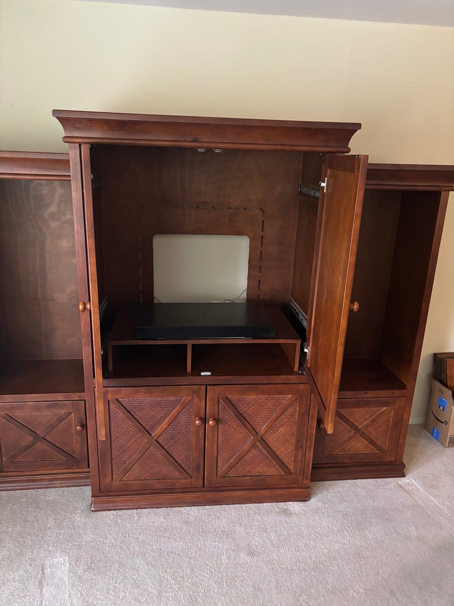 Spacious Brown Wood Entertainment Center with Woven Cabinet Doors