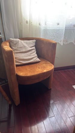 Burnt orangey-yellow sitting chair + stool