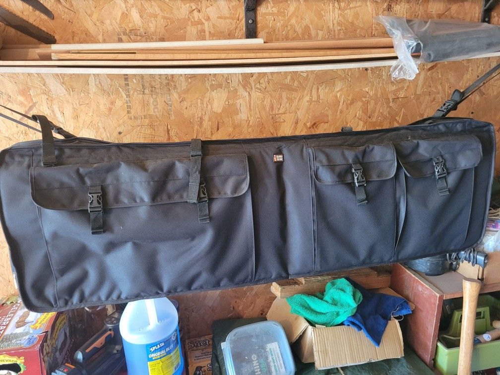 UTV Shotgun Or Rifle Holder Carries 2 Plus Storage Pockets.