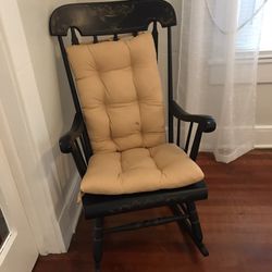 Solid Wood Rocking Chair, Excellent  Condition   Spindle Back  Inclues Cushion   