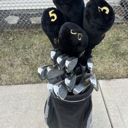 Complete set of men’s RH King Cobra golf clubs in an Ogio cart bag