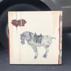Horse on wooden board painting