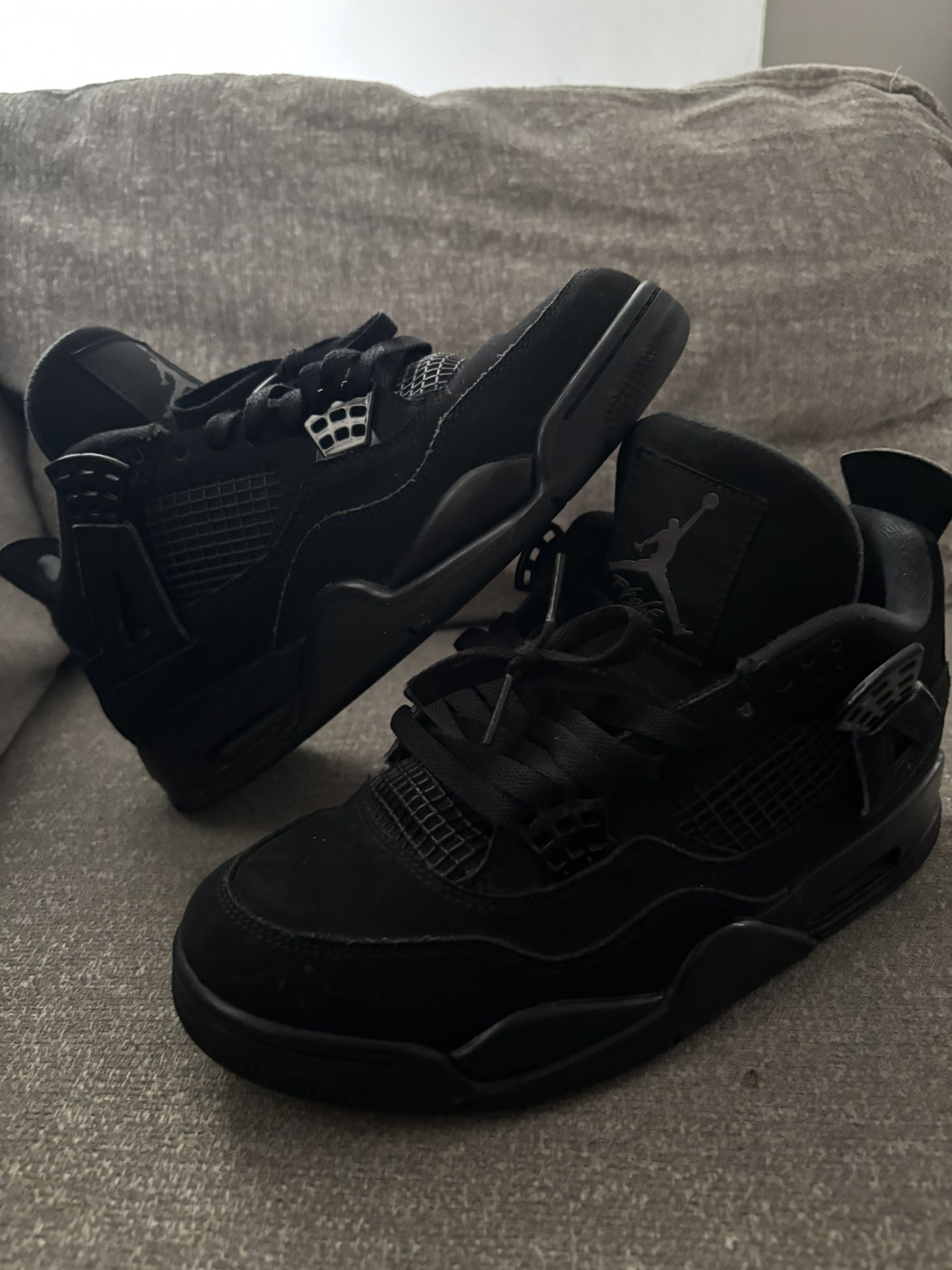 black cat jordan 4s