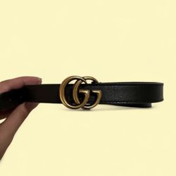 Size 26 Gucci GG belt. Fits waist size 23-28. This belt is authentic and in amazing condition. This is my personal belt that I stamped extra holes in,