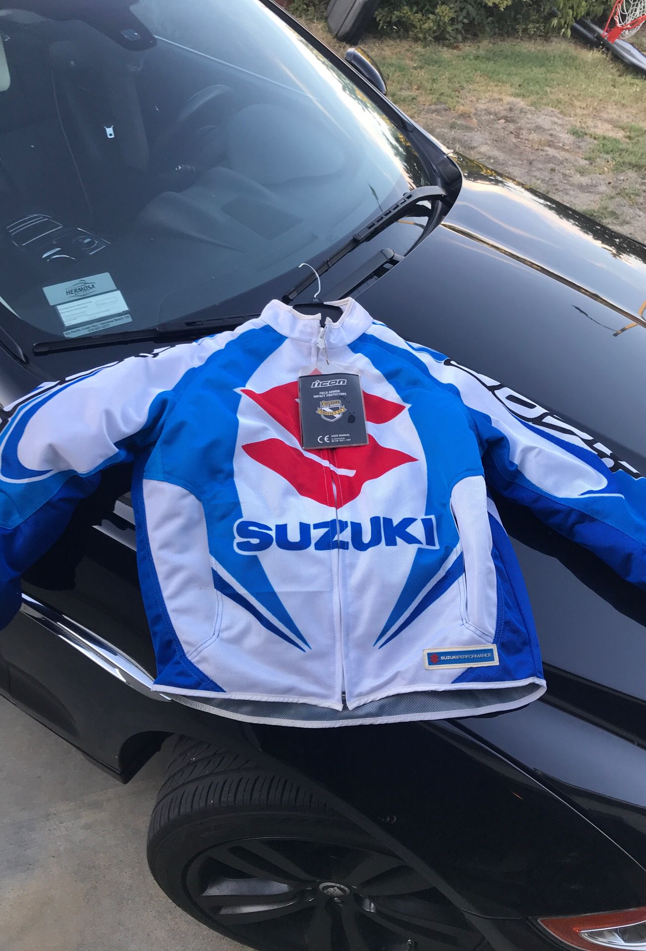 Suzuki motorcycle jacket brand new originally paid 300$ selling for 200$
