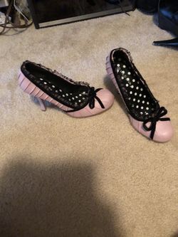 Pink and black heel.