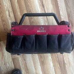 This is a Husky 17 in. Open Tool Tote with Rotating Handle. 