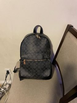 Black leather coach backpack