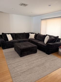 Large Custom living spaces sectional With Custom Storage Ottoman