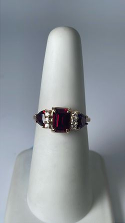 14k gold ring with red and clear CZ