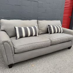 Cozy Grayish Two Seater Couch! ***Free Curbside Delivery***