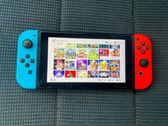 NINTENDO SWITCH with 125 SWITCH GAMES