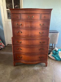 Hardwood furniture bedroom cabinets. Tall dresser and shorter longer dresser. Real wood.