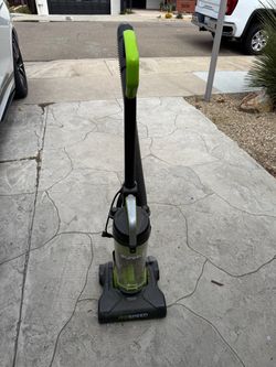 Three corded vacuums