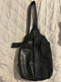Tumi Alpha Bravo Smith Sling in Black with luggage tag