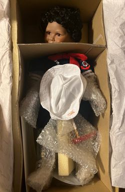 “Tyrone” Porcelain Doll w/Toy Boat