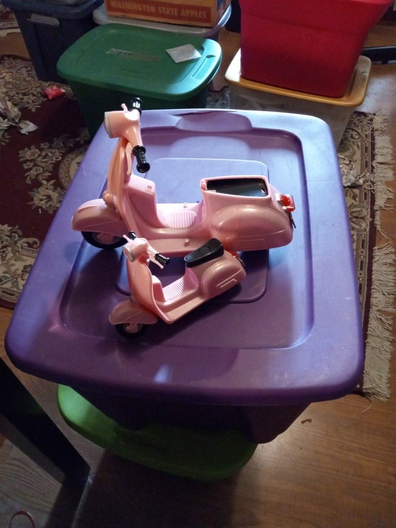 Pink Moped Scooters
