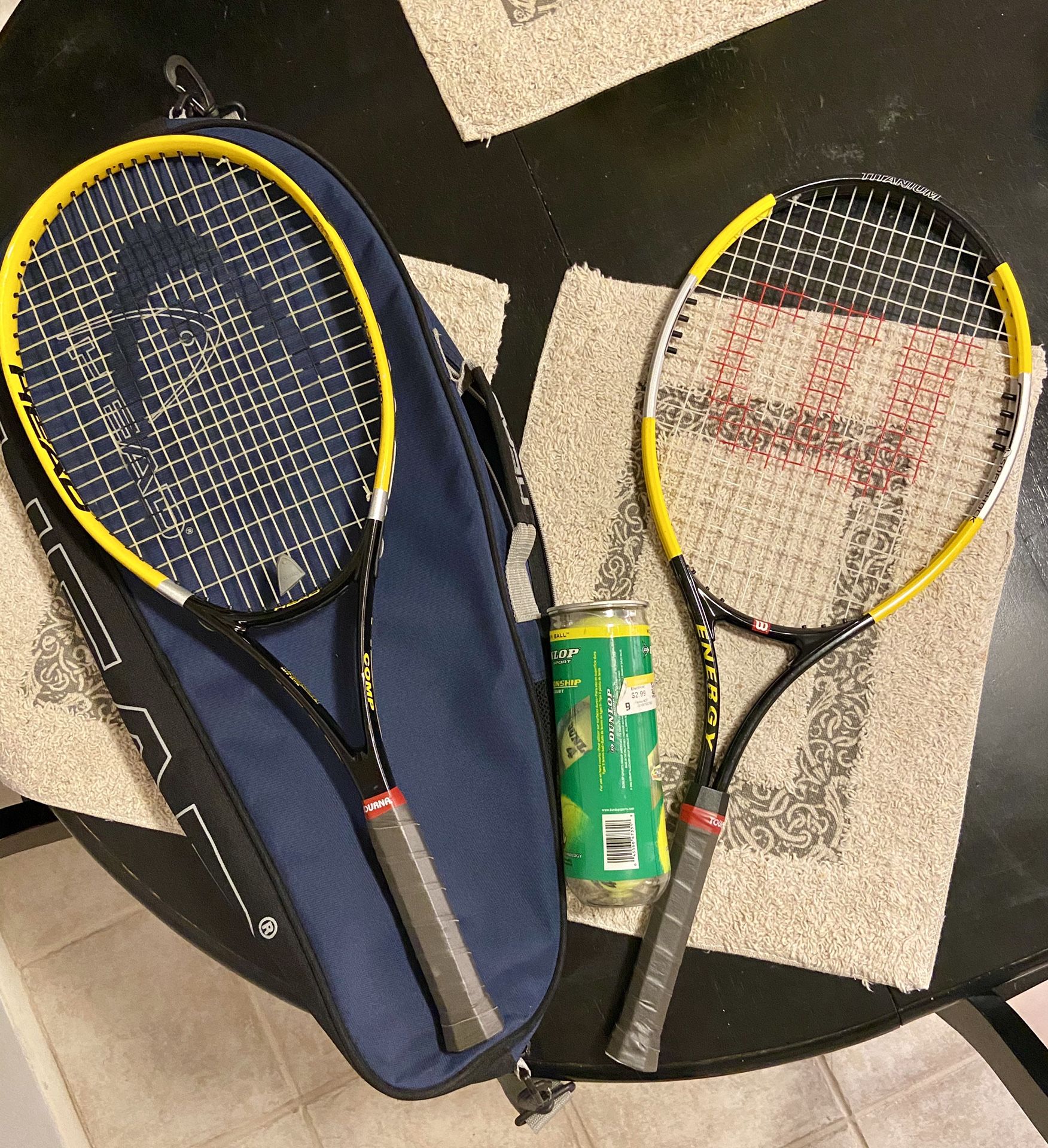 1 Head & 1 Wilson Tennis Rackets (w/ Head bag, new grips & 1 can of unopened Tennis balls)