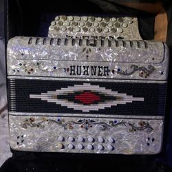 White Hohner Accordion